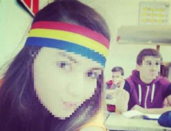 Eleva Sabina Elena din Covasna amenintat cu moartea pentru tricolor