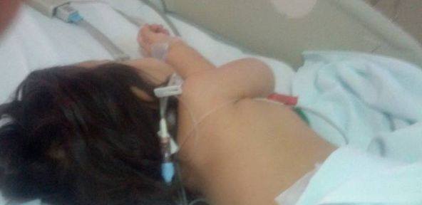 Foto: Fiica lui Gabriel Marinescu, aflata intr-un spital din Romania fara a i se oferi nici o cauza a sindromului
